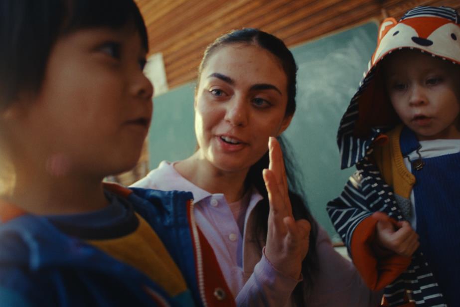 Woman teaching children how to count