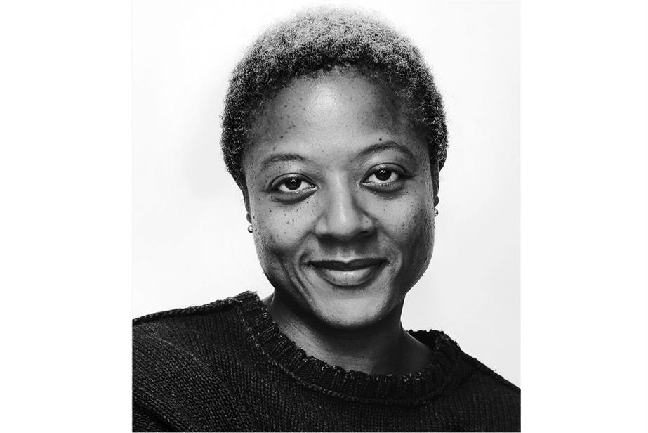 Black and white head and shoulders shot of Kemi Anthony