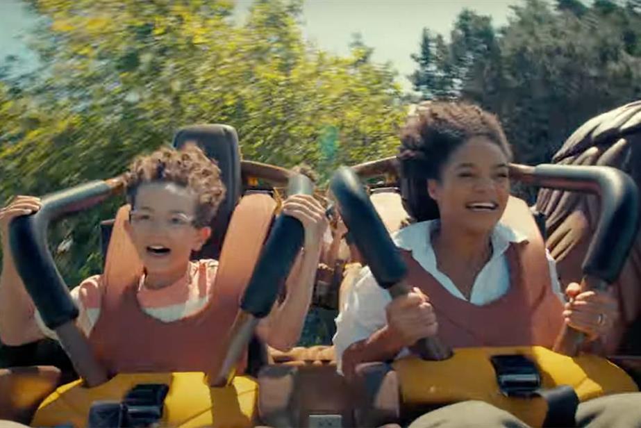 Two children on a theme park ride