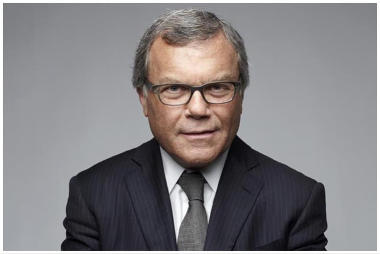 Sir Martin Sorrell smiles slightly at the camera