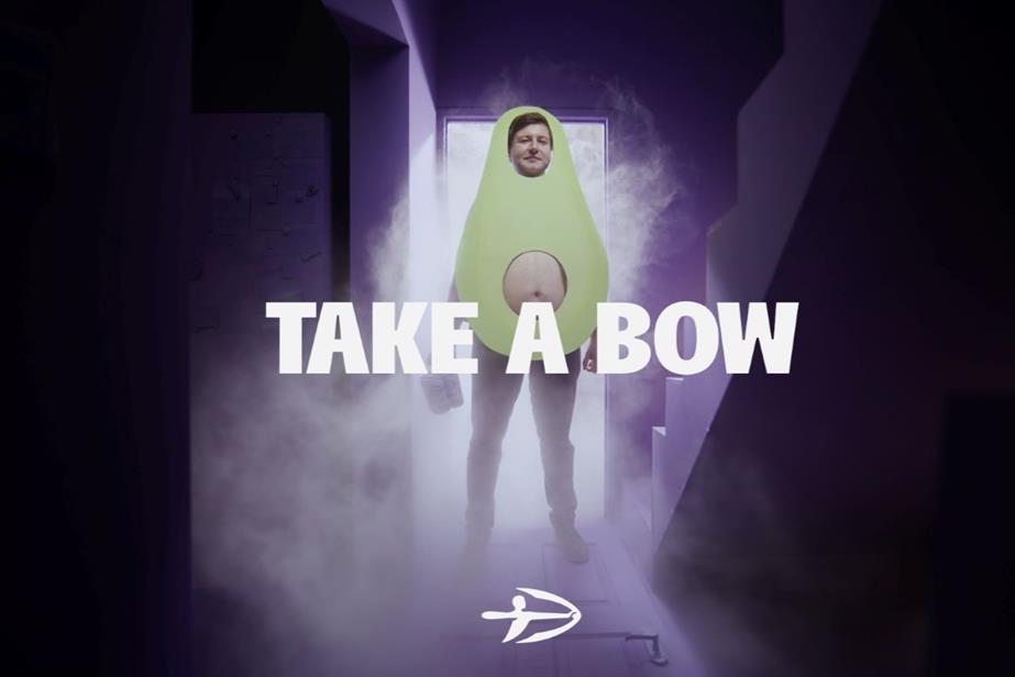 A man in an avodaco costume and the words 'take a bow'