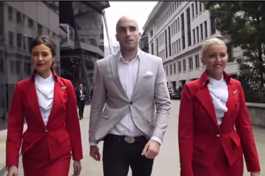 DMC was flanked by Virgin Atlantic cabin crew