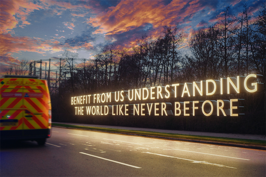 “See a better place” spot with ambulance on left hand side and light up words on the right saying "Benefit from us understanding the world like never before"