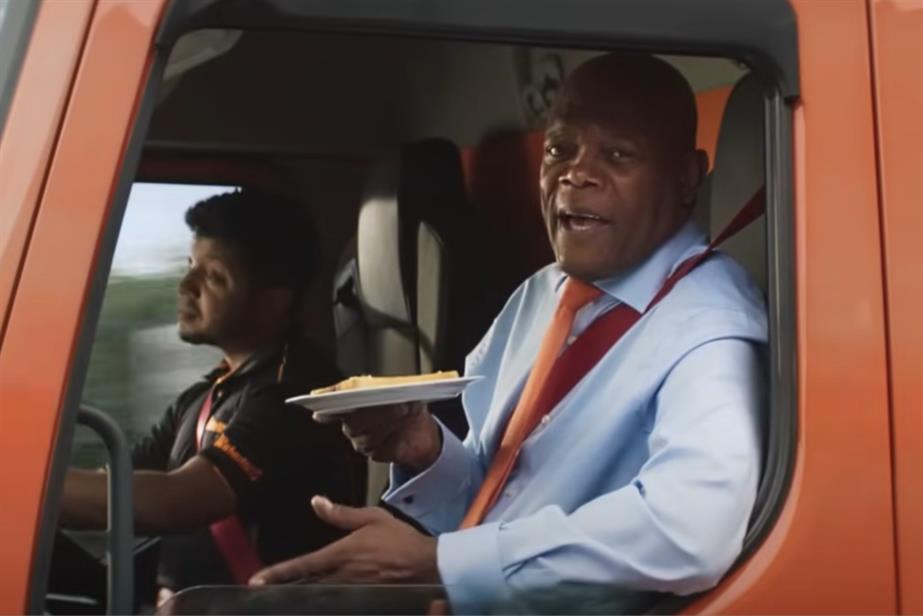Samuel L Jackson with a slice of toast in a van
