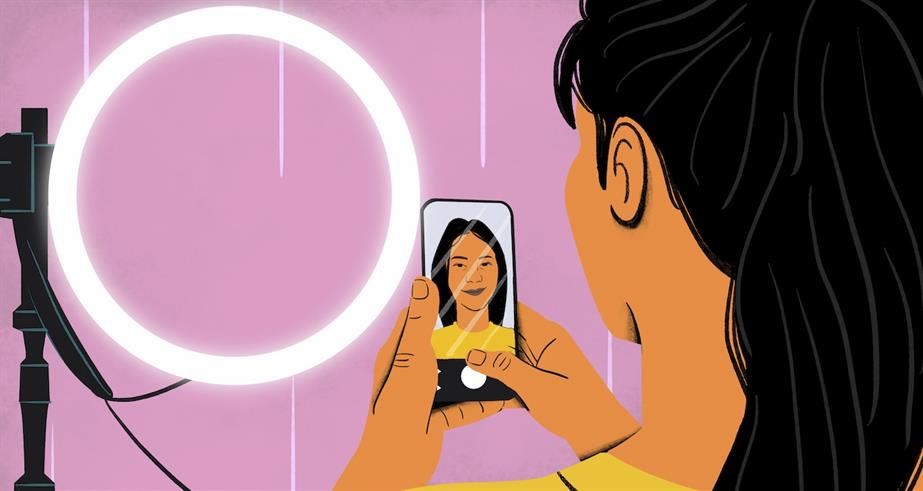 An illustration of a woman using a phone to take a selfie with a light in the background