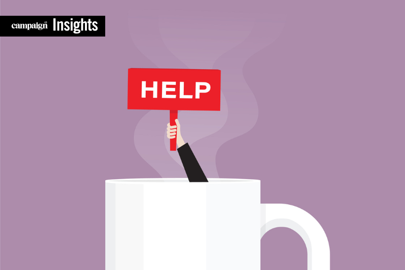 Clip art of arm reaching out of coffee cup holding a sign reading "help"