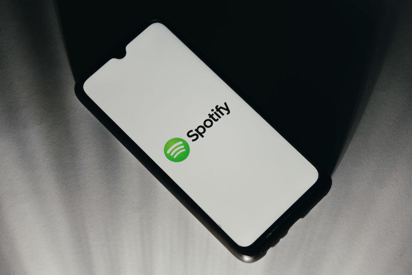 Smart phone displaying Spotify logo