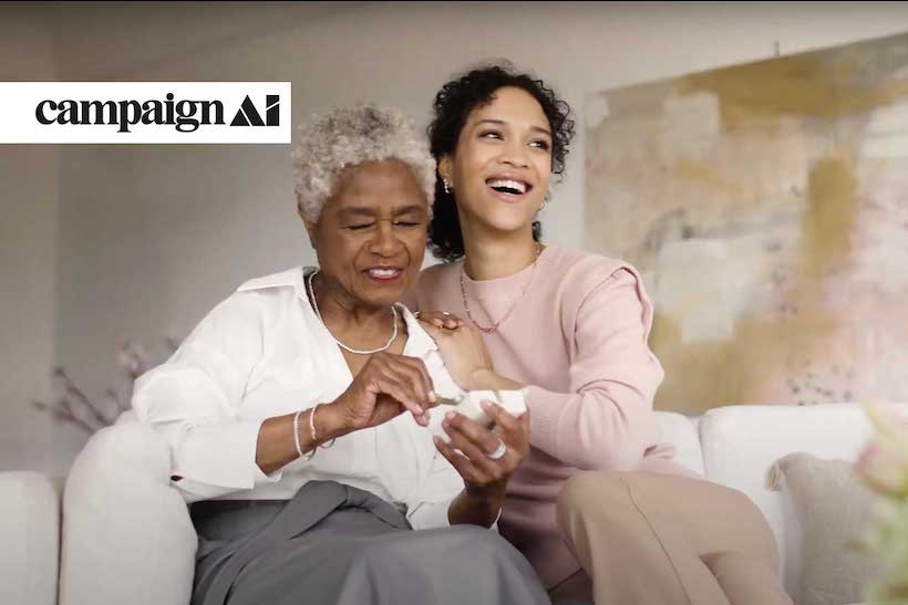 Signet Jewelers ad ad with two woman opening a box 