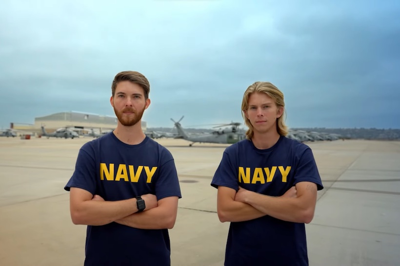 Two people wearing Navy t-shirts