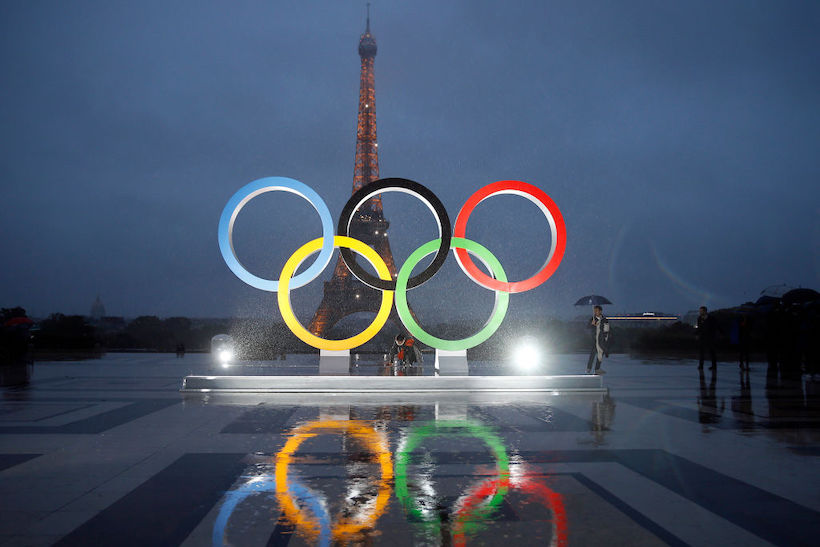 Olympics rings are seen in front of the Eiffel Tower in Paris