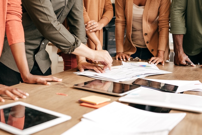 Stock art of a team working on a project 