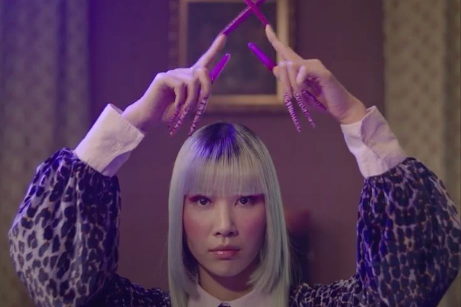 Woman with long acrylic nails