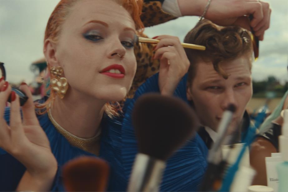 Woman doing her make up