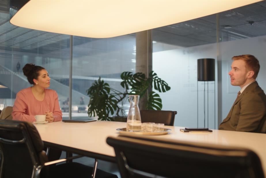 Woman and man in office