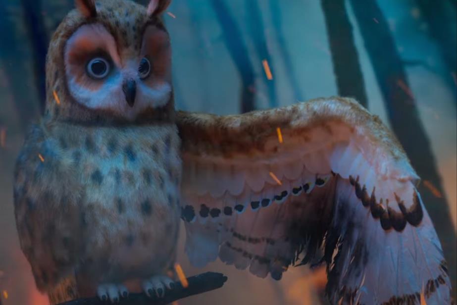 An owl in a forest fire