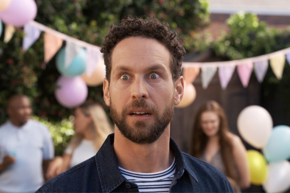 Man at garden party
