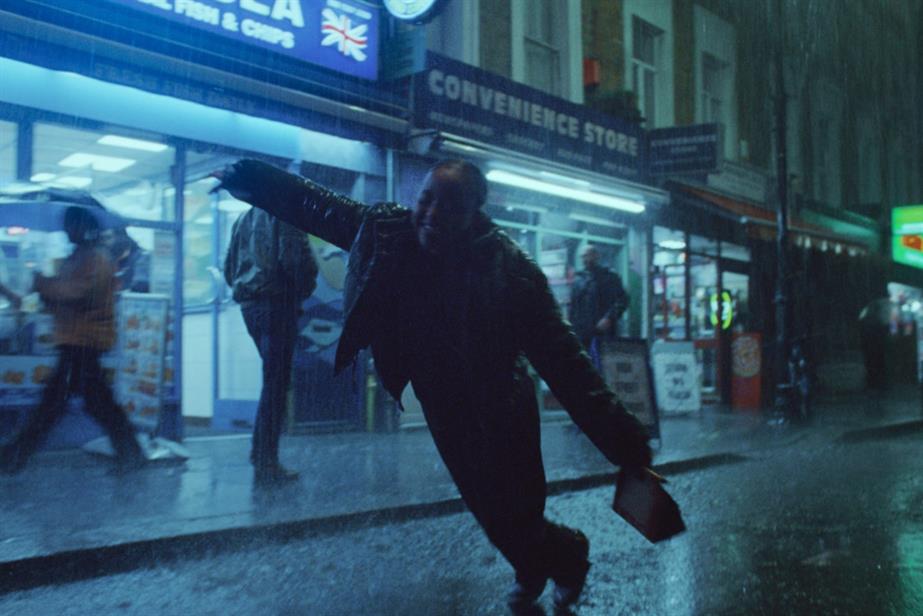 Woman dancing in the rain