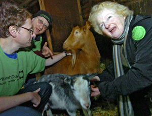 Left to right, Patterson, Bourne, goats, Neuberger