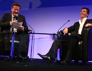 Morgan (left) and Cowell entertain Norwood's dinner guests