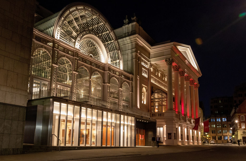 The Royal Opera House illuminated in yellow for the first anniversary of the Covid-19 lockdown. Photo by Jo Hale/Getty Images