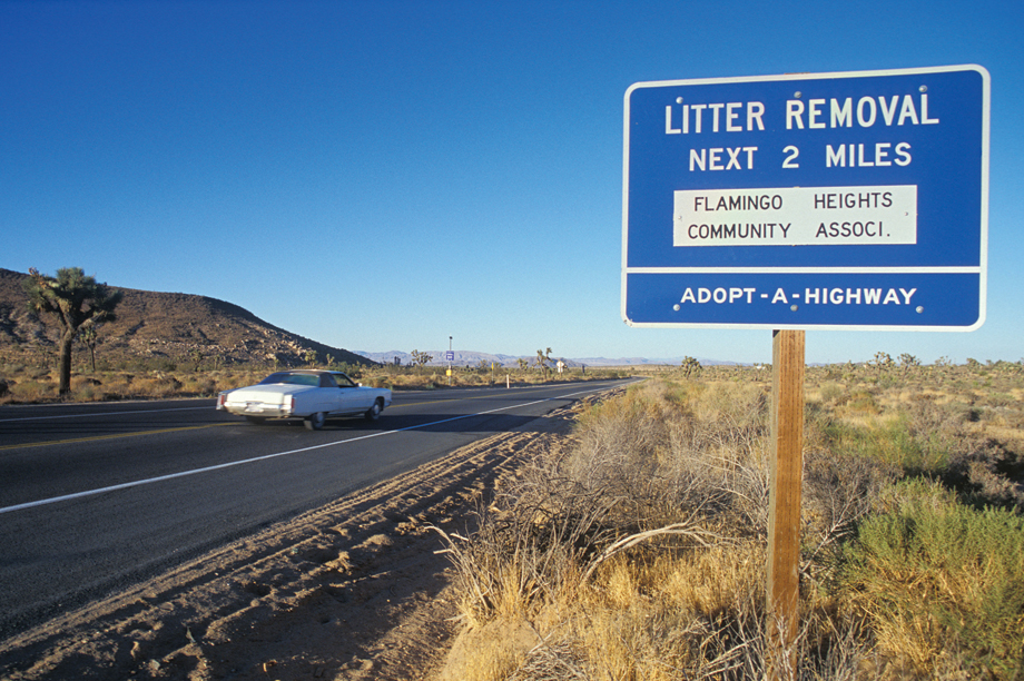 Cultural difference: In the US, some road cleaning is a charitable activity