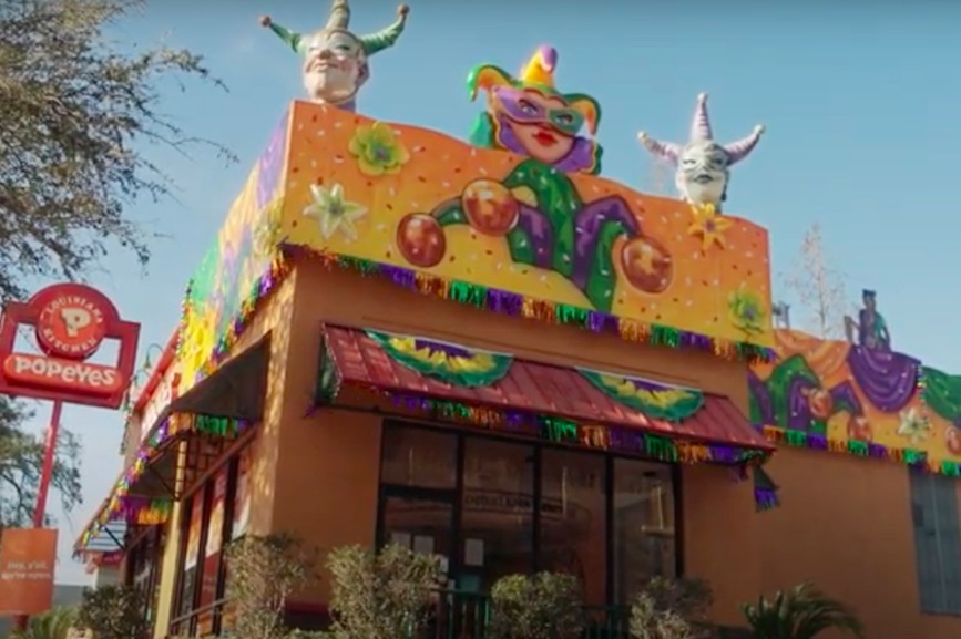 Why Popeyes turned its restaurants into Mardi Gras floats