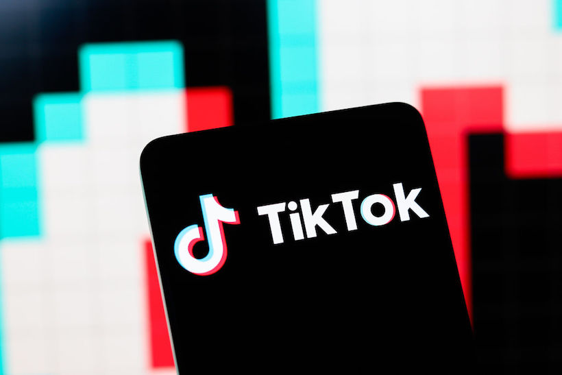 TikTok logo on smartphone screen