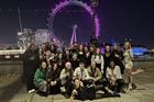 The Missive team in front of the London Eye in Christmas party clothes