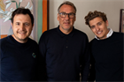 Three men from Recoverlution standing side by side including Paul Merson in the middle