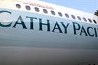 A close-up shot of a Cathay flight with the logo