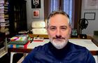 Candit shot of Chris Perry in his home office