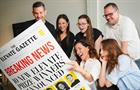 Content featuring oversized newspapers was created for the Elevate Prize Foundation's social media channels. 