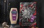 Hellmann’s Craven Proof garlic aioli bottle next to the book The Primal of Blood and Bone