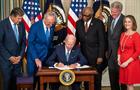 President Joe Biden signs the IRA into law