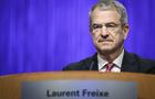 Laurent Freixe stands behind a lectern