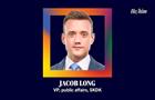 Headshot of Jacob Long with pronouns he-him pronouns