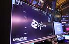Image of the Pfizer logo at a stock exchange.
