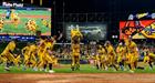 Members of the Savannah Bananas performing on field
