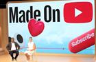 Neal Mohan and Katarina Mogus speak onstage