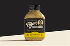 Jar of mustard labeled Bijan Mustardson with picture of Bijan Robinson