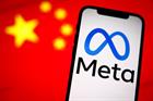 Smart phone displaying Meta logo in front of Chinese flag