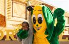 image of Corn Kid with a corn mascot.