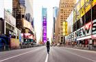 Man walking in the middle of Times Square, New York City, USA - stock photo