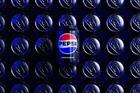 A photo of a Pepsi can with the new PepsiCo logo