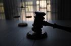 Justice hammer or gravel on a table, concept image