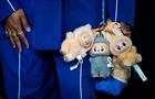 Influencer Francis Dominic carries three Labubu toys at Paramount+'s world premiere of "Dexter: Resurrection" at Alice Tully Hall at Lincoln Center