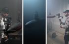 Photographer taking pictures of model submarine