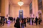 Medtronic installation at Grand Central Terminal displaying how many people could read if they lived to 150 years old