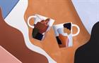 Two ceramic coffee mugs with abstract illustrations of women of color