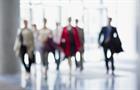Out-of-focus photo of figures walking